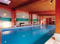 self-catering holiday cottage complexes often have shared use of a heated swimming pool,  gym, sauna, tennis courts and much more